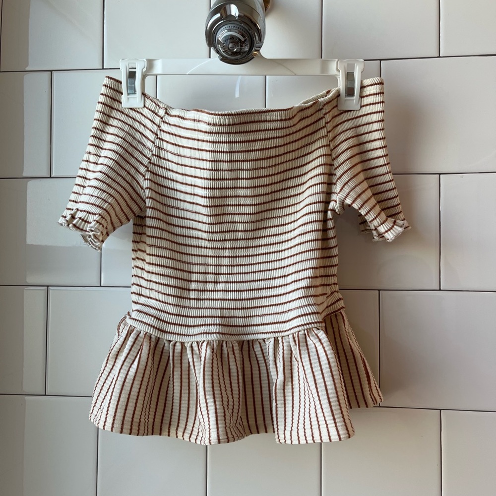 Medium size stretchy stripe peplum top